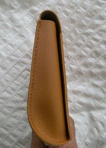 Acqua di Parma tan coloured pouch