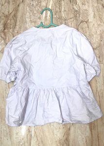 Embroidered light blue Peplum Top