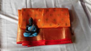 Elegant Orange Silk Saree with Golden Zari