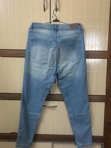 Ripped Light Wash Denim Jeans