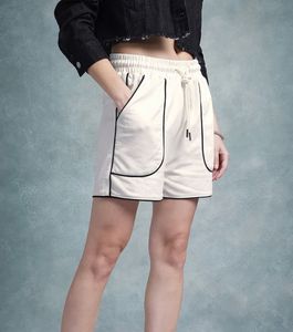 Cream Sweatshorts with Black Piping