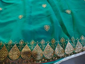 Elegant Teal Embroidered Saree