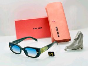 MIU MI Tortoiseshell Sunglasse
