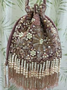 Embroidered clutch