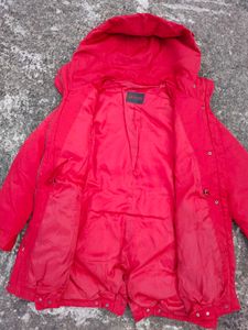 Vibrant Red Puffer Jacket with a Hoodie