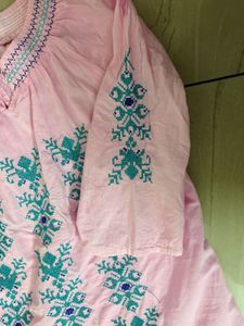 Elegant Pink Kurta with Intricate Embroidery