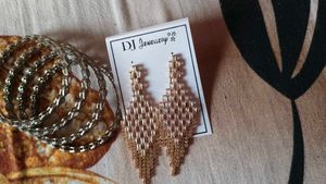 ad America diamond earring and mirror work bangles