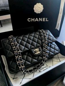 Chanel Classic Flap Bag - Black Lambskin