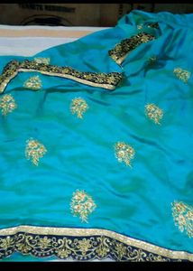 Stunning Teal Saree with Gold Embroidery