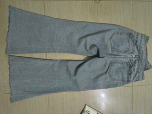Light Wash Flared Jeans with Button Detail