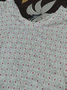 Elegant White Saree with Red Motifs