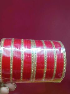 Red Bangles with Golden Embellishments