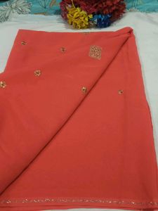 Elegant Orange Saree with Golden Embellishments
