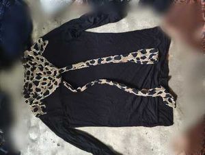 a black long-sleeved top or blouse