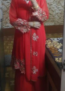 Pakistani Orange Embellished Kurta Set
