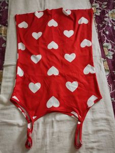 red colour camisole with heart shape pattern