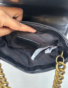 Chic Quilted Black Handbag with Gold Chain
