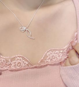 Silver Bow Pendant Necklace