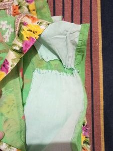 Beautiful Green Saree with Floral Embellishments