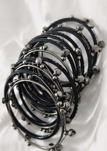 Set of Dark Metal Bangles with Bells