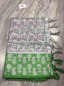 Elegant Green Saree with Silver Border