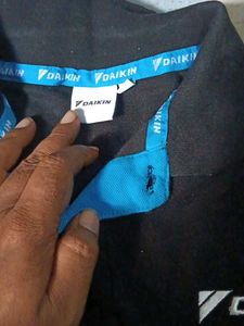 Men's Daikin Black Polo T-Shirt