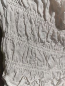 white smocked ruffle crop top