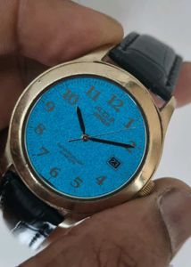 Elegant Gold Watch with Blue Dial