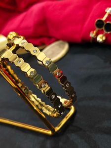 Elegant Gold Hexagonal Bangles with Crystals