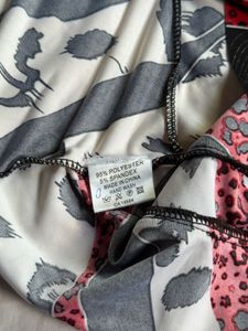 Y2k asymmetrical peplum top