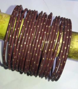 Set of Maroon Bangles with Gold Embellishments