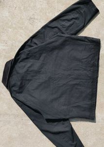 Uniqlo black windbreaker jacket.