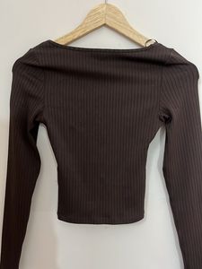 brown top with a small bow
