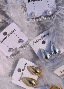 Korean Studs Silver And Gold One Pair 99