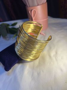 Set of Elegant Gold Tone Bracelets