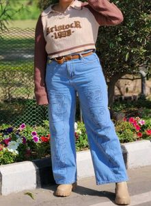Artistic Face Print Jeans