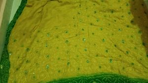 Beautiful yellow and green saree