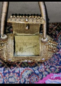 Gold Clutch with Embellishments