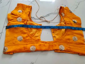 Orange Lehenga with Teal Dupatta