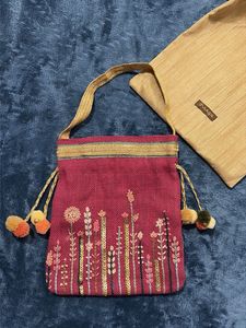 Embroidered Potli Bag with Pom Poms