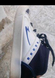 Stylish Navy and White Sneakers