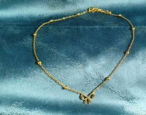 Delicate Gold Bow Necklace