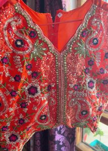 Flowing Orange Ethnic Skirt with choli and jacket