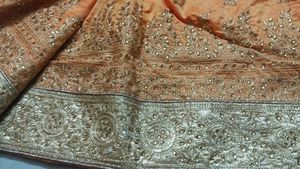 Elegant Orange Embellished Saree