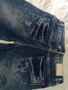 Blue Distressed Denim Jeans