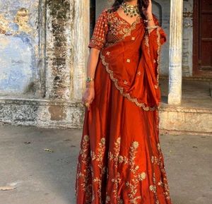 Elegant Orange Embroidered Lehenga Choli