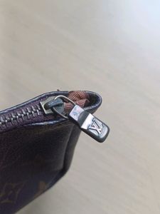 Louis Vuitton Pouch With A Single Compartment