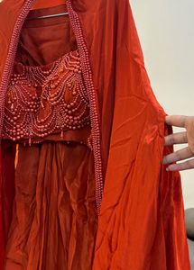 Elegant Orange short blouse and skirt with shrug