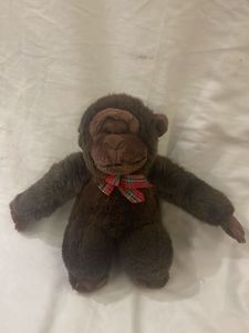 Adorable Plush Monkey with Plaid Bow