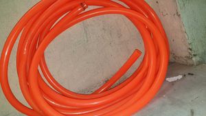 Durable Orange Hose for Various Uses